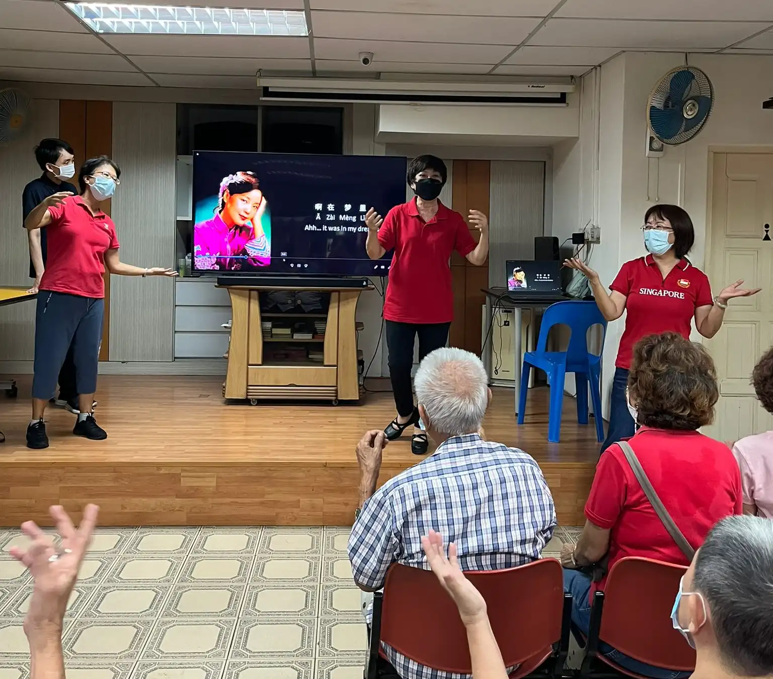 Seniors participating in a Laughter Yoga session at Banda Senior Activity Centre