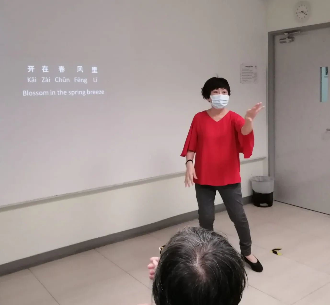 Sara Mei Woo leading the Laughter Yoga session at CDAC Tampines