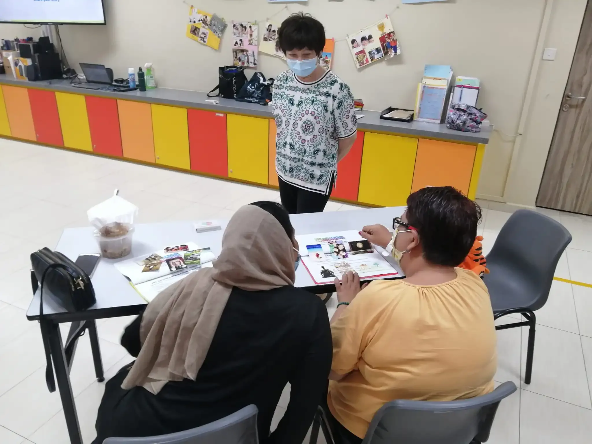 Women learning communication and presentation skills during the training course