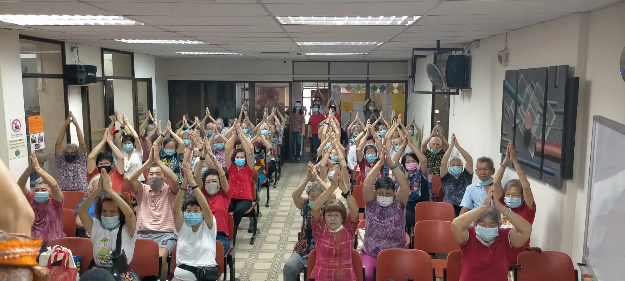 SWA Laughter Yoga team with seniors at Kreta Ayer Senior Activity Centre