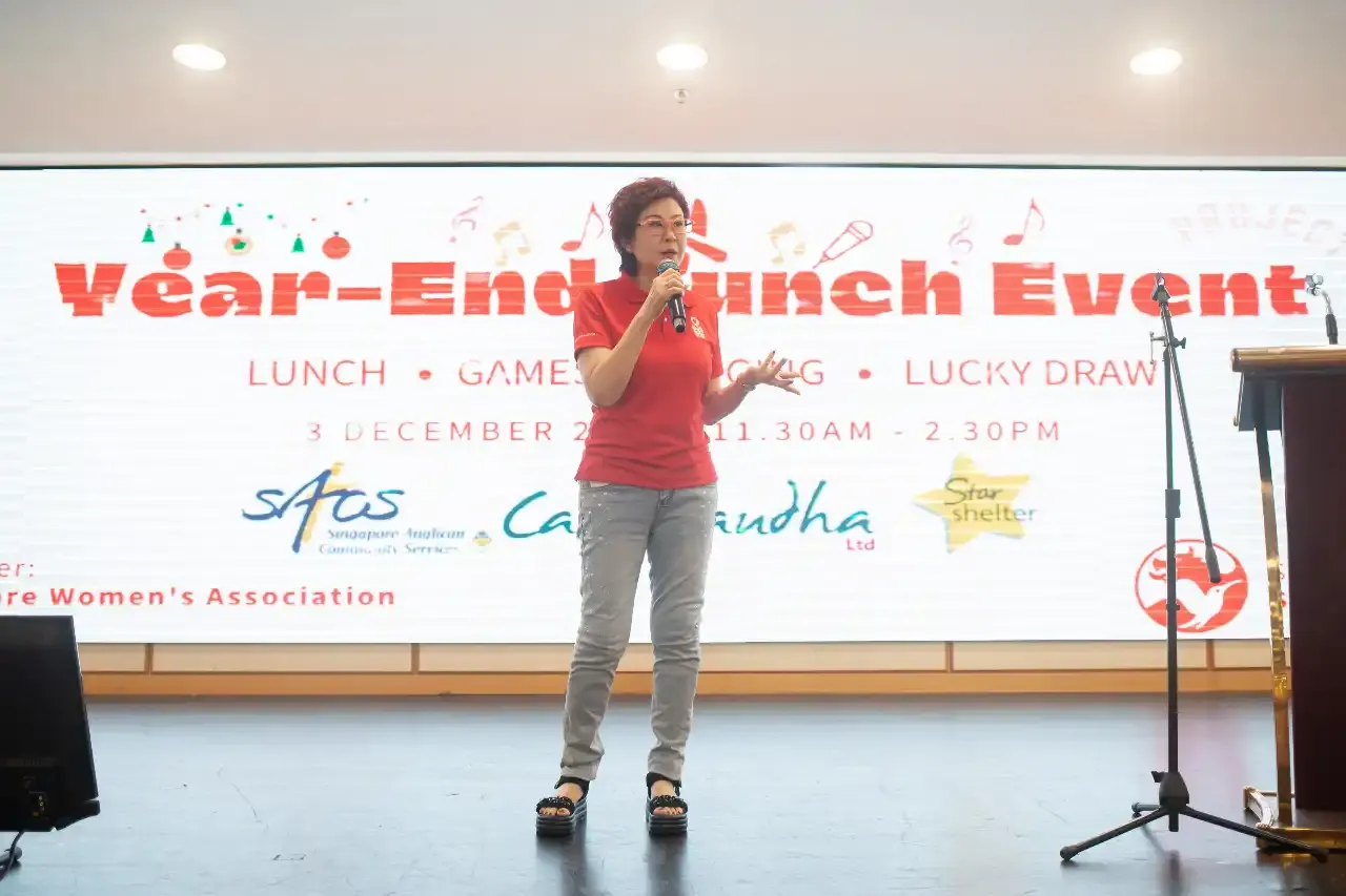 SWA President Lee Li Hua delivering her welcome speech at the year-end lunch