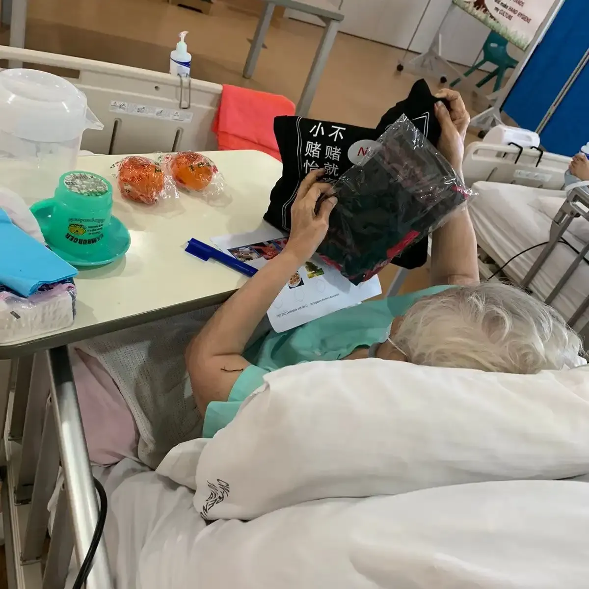 Ren Ci residents smiling and participating in Lunar New Year activities via Zoom