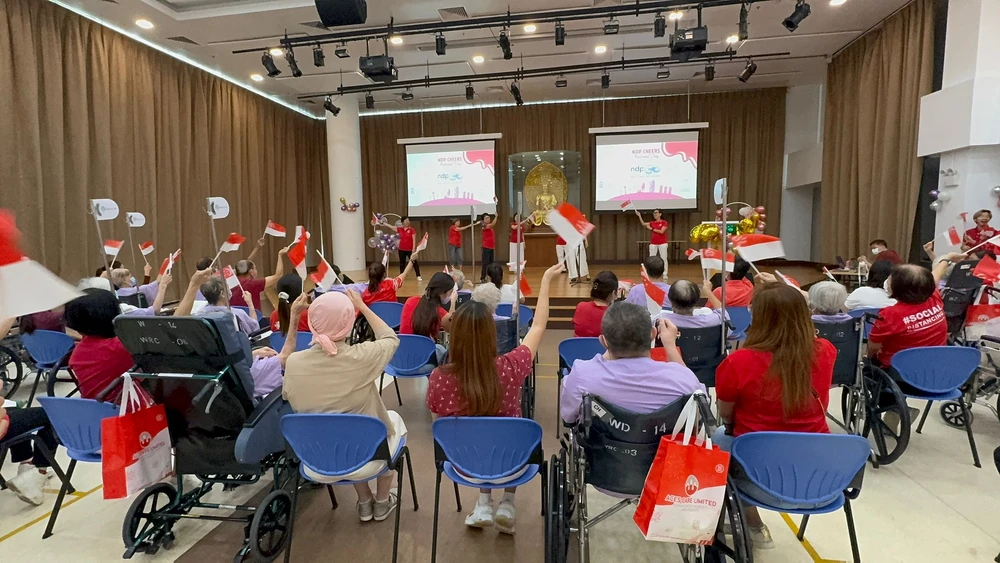 SWA Laughter Yoga Wellness Club leading residents in NDP-themed session