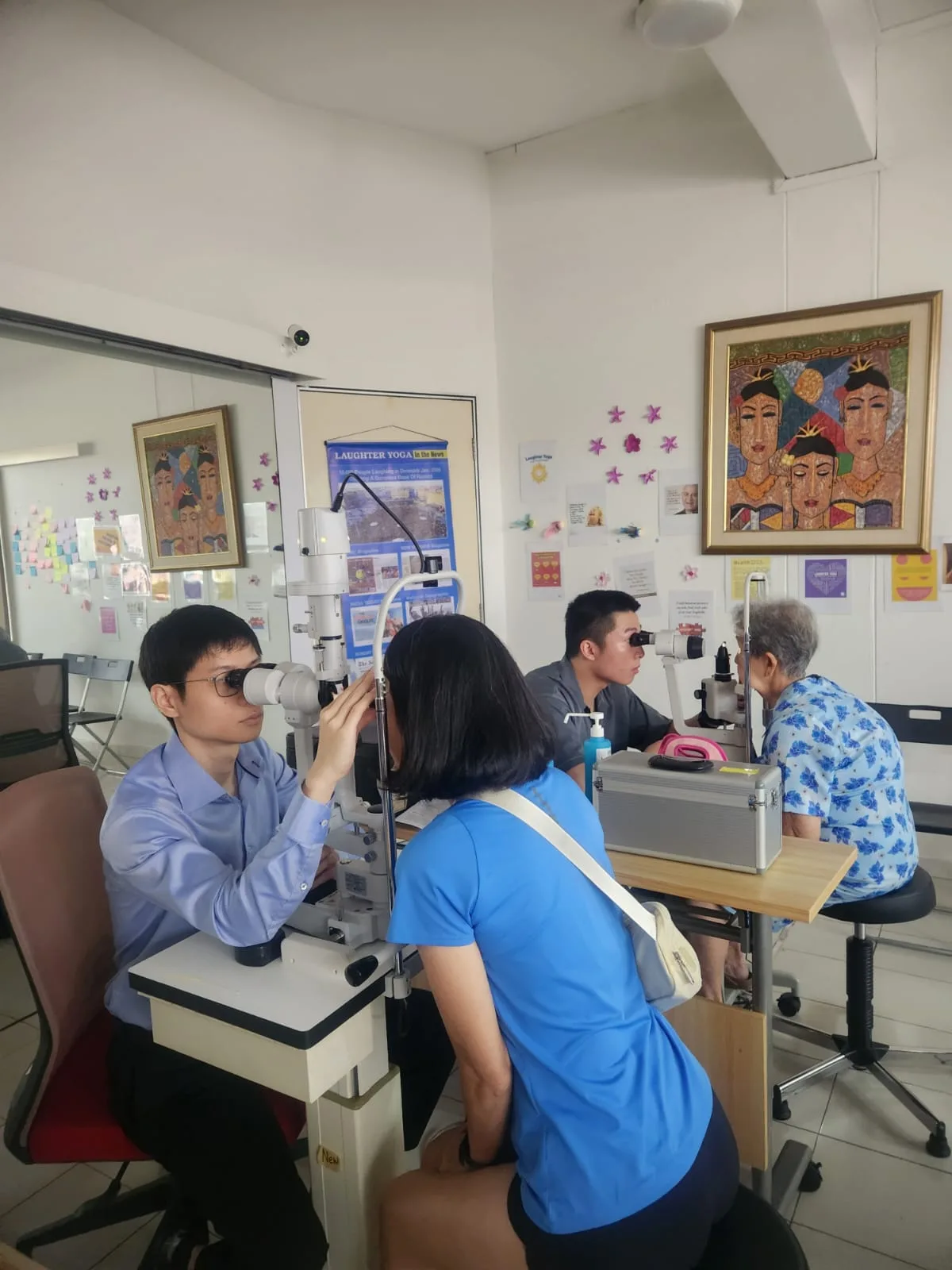 Eye screening in progress with volunteer doctors