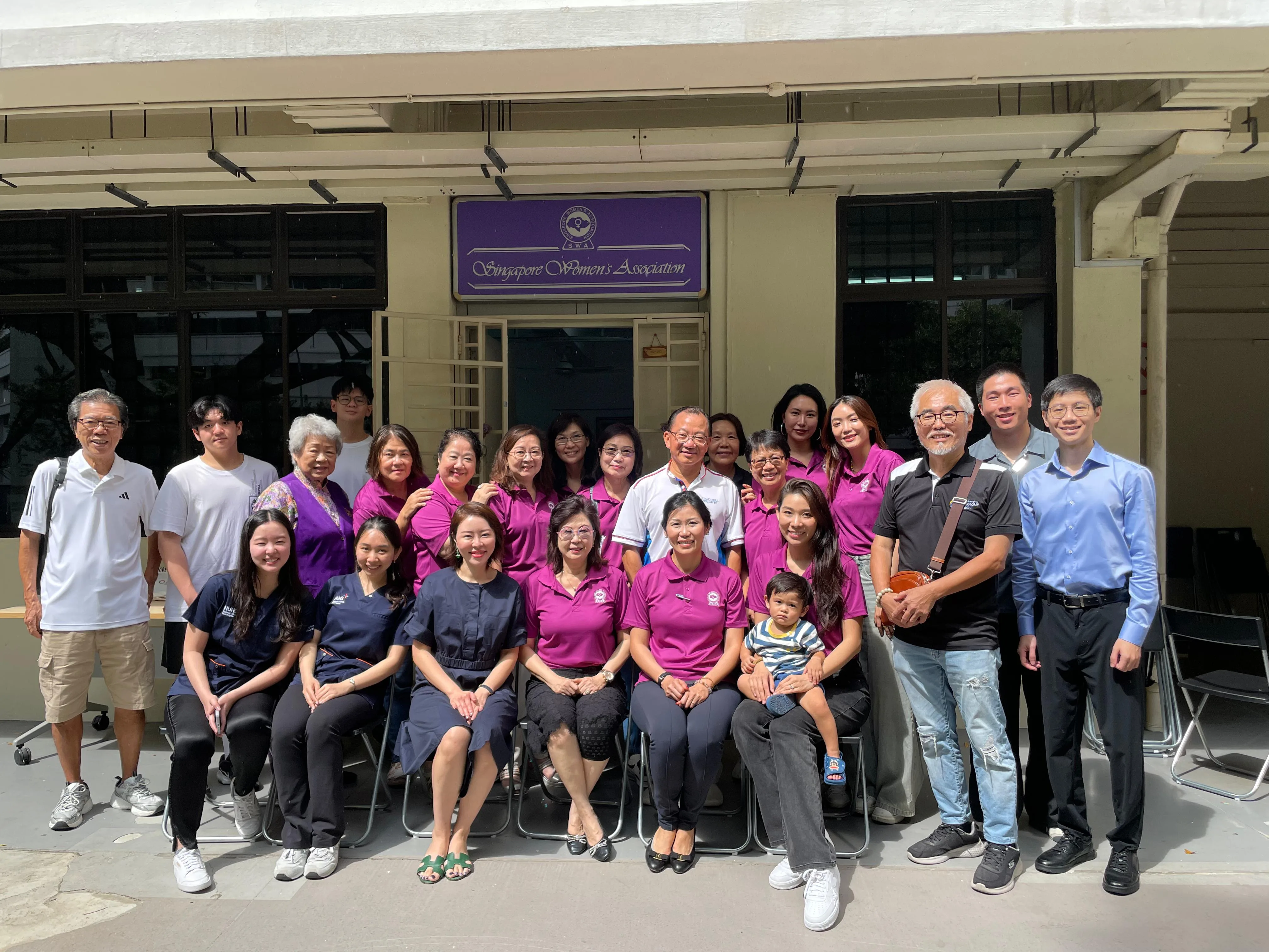 Group photo of volunteers, doctors and participants at SWA Eye Screening event