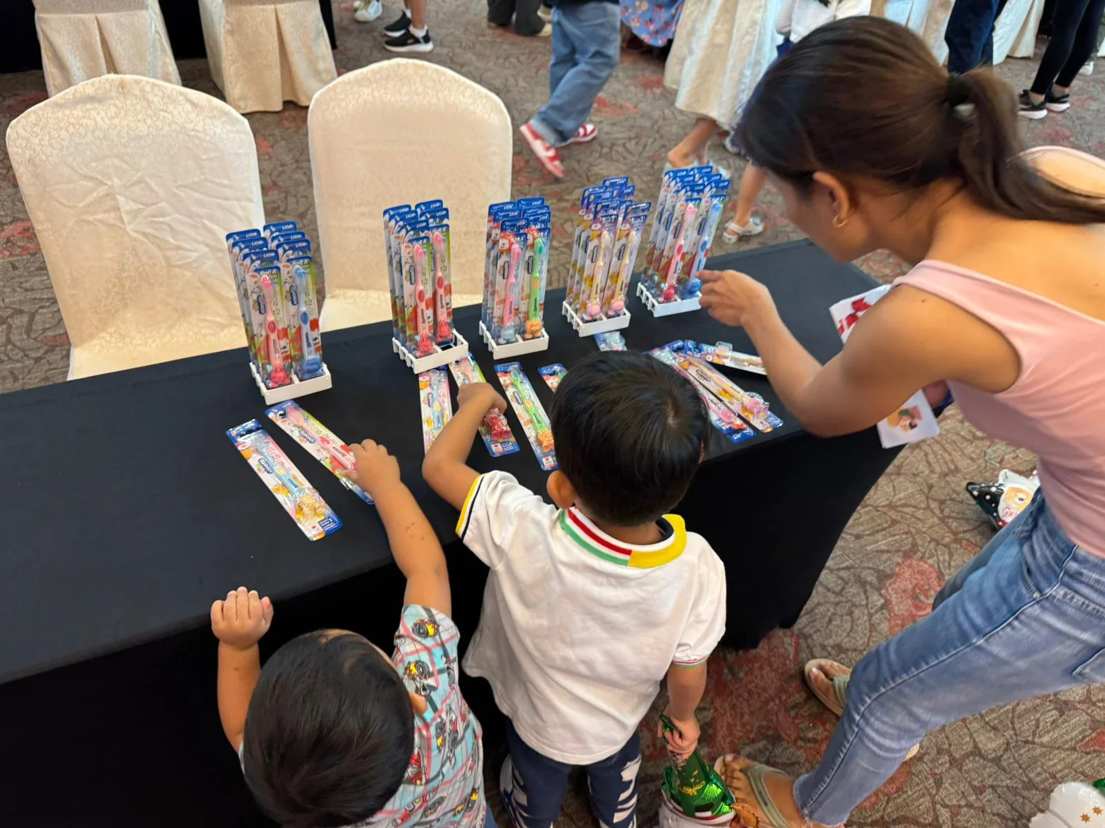 Children enjoying game booth activities