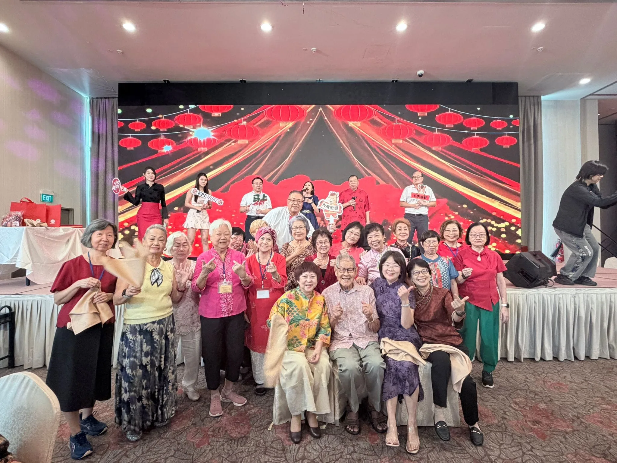 A 99-year-old senior from SNM receiving a longevity ang bao
