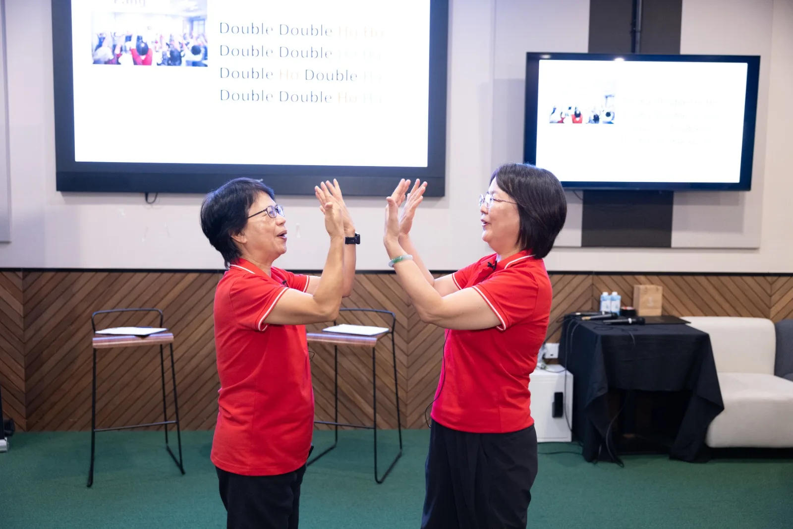 Certified Laughter Yoga teacher Feng Fang guiding participants