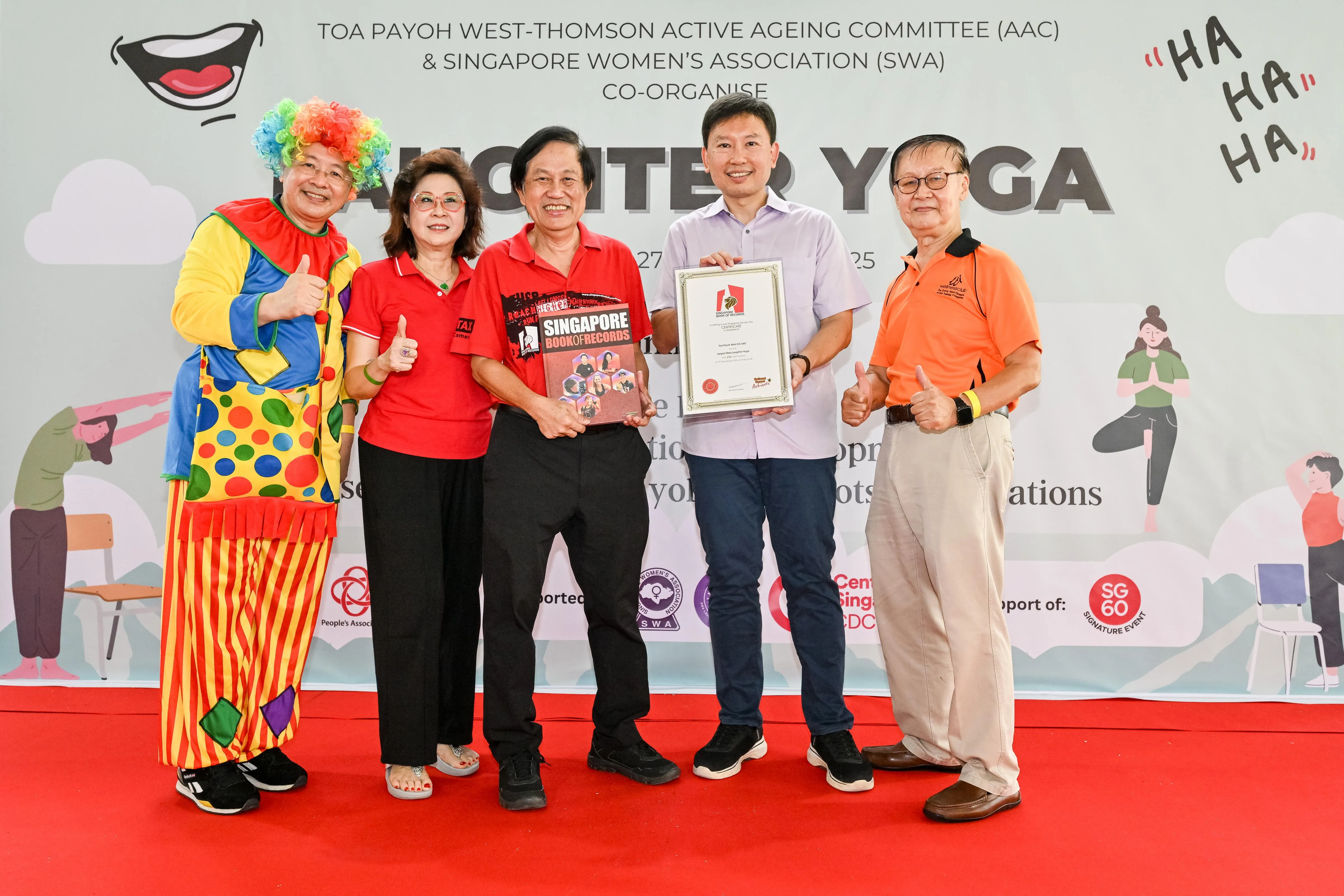 Singapore Book of Records certificate presented to SWA for Largest Mass Laughter Yoga Session with Minister Chee Hong Tat